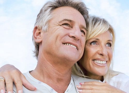 Smiling older couple after annual physicals